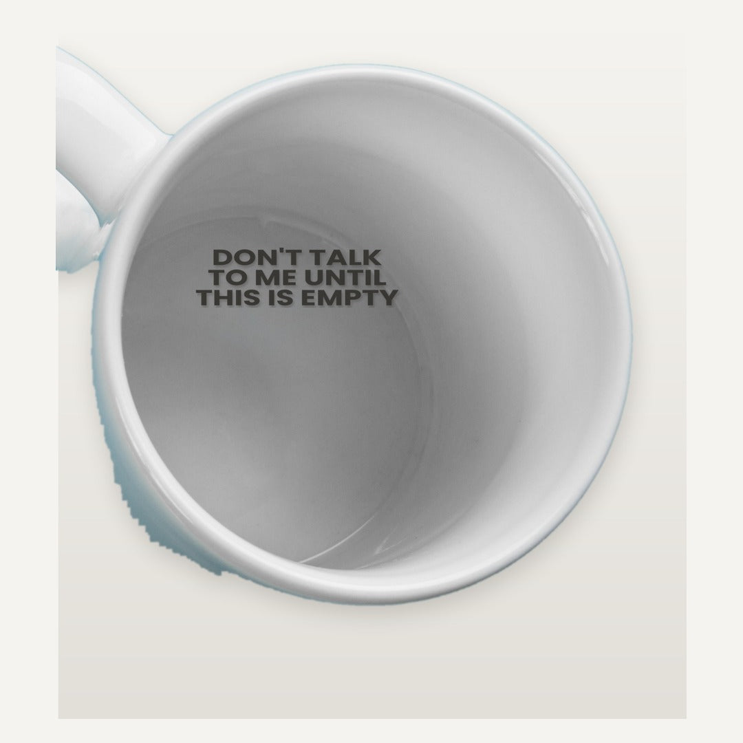 Hidden message inside the mug: don't talk to me until this is empty